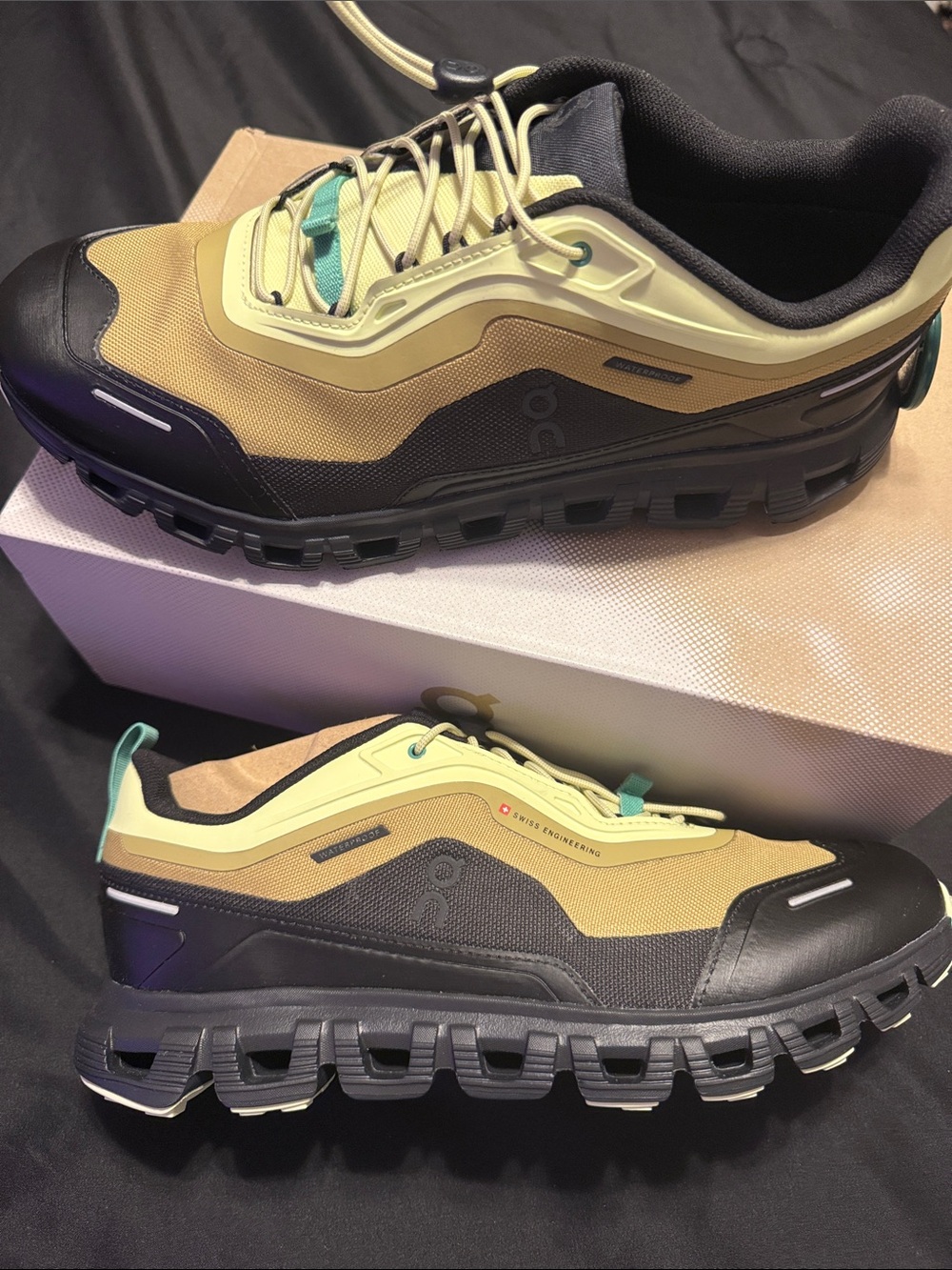 On Running Men's Trail Sneaker in Tan, Black & Teal Accent